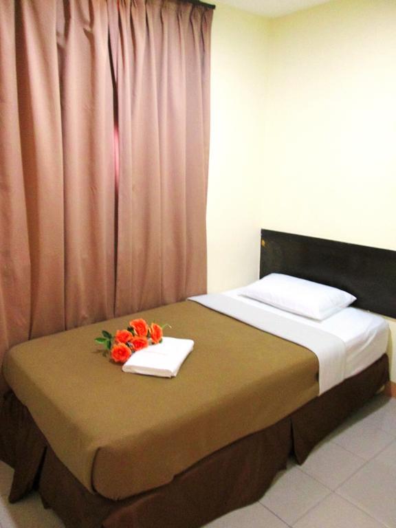 Sunnie Hotel Τζόχορ Μπάχρου Δωμάτιο φωτογραφία
