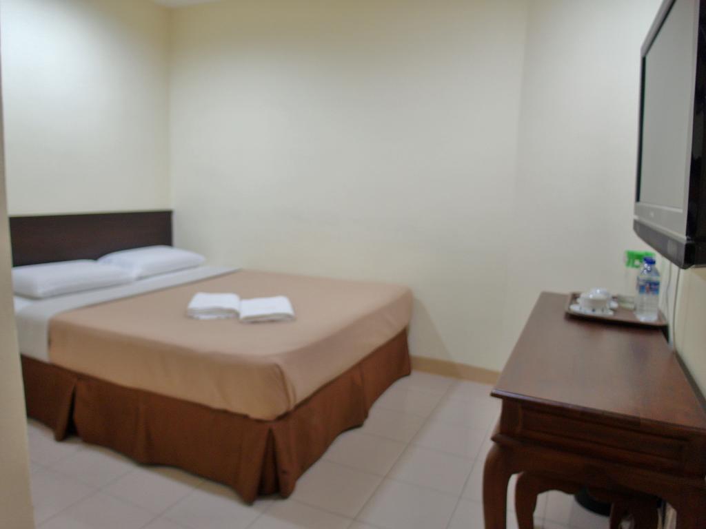 Sunnie Hotel Τζόχορ Μπάχρου Δωμάτιο φωτογραφία